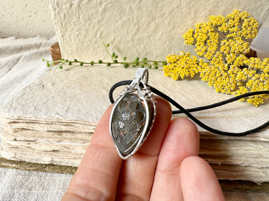 Carved Labradorite Flower Wire Wrapped pendant in Sterling Silver